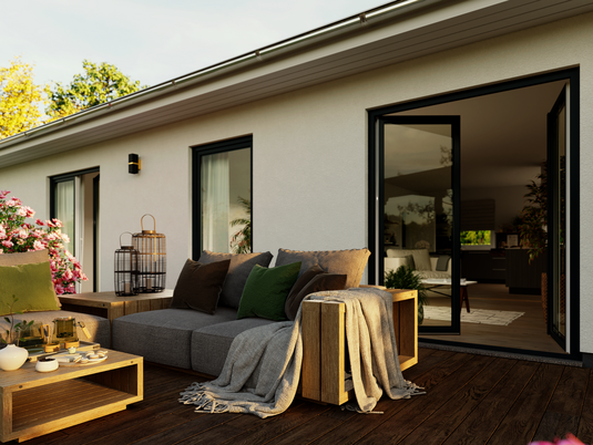 Terrasse des ERA 131 mit Blick auf den offenen Wohnbereich – modernes Wohnambiente trifft auf stilvolle Gestaltung